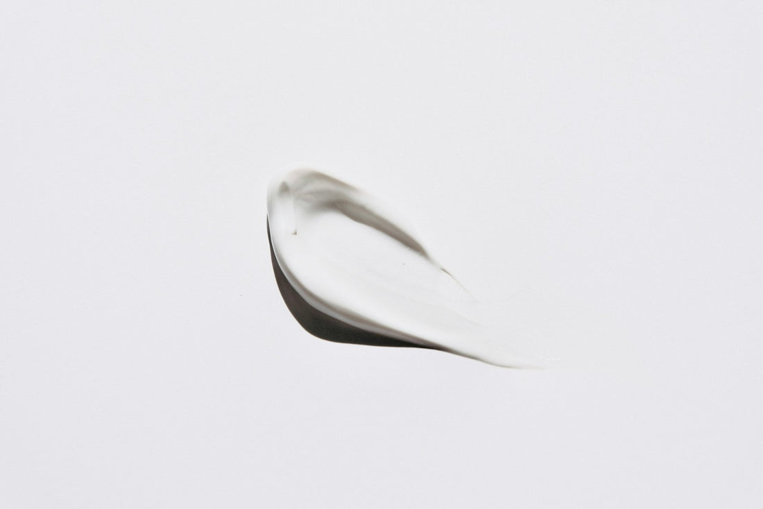Smear of skincare cream on a white background