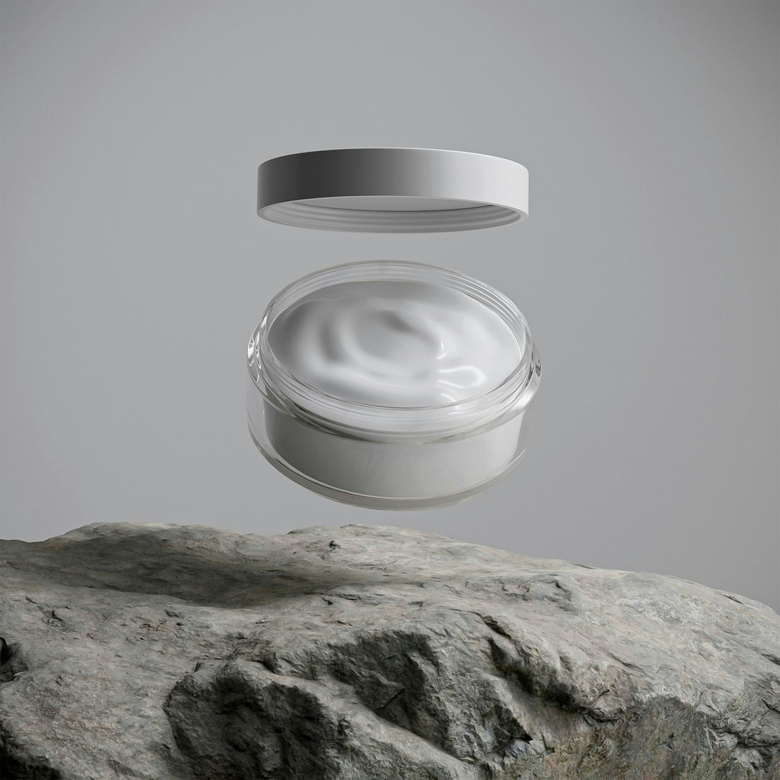 Jar of rich moisturising cream on a stone